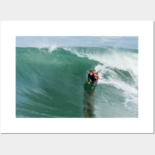 Bodyboarder in action Posters and Art